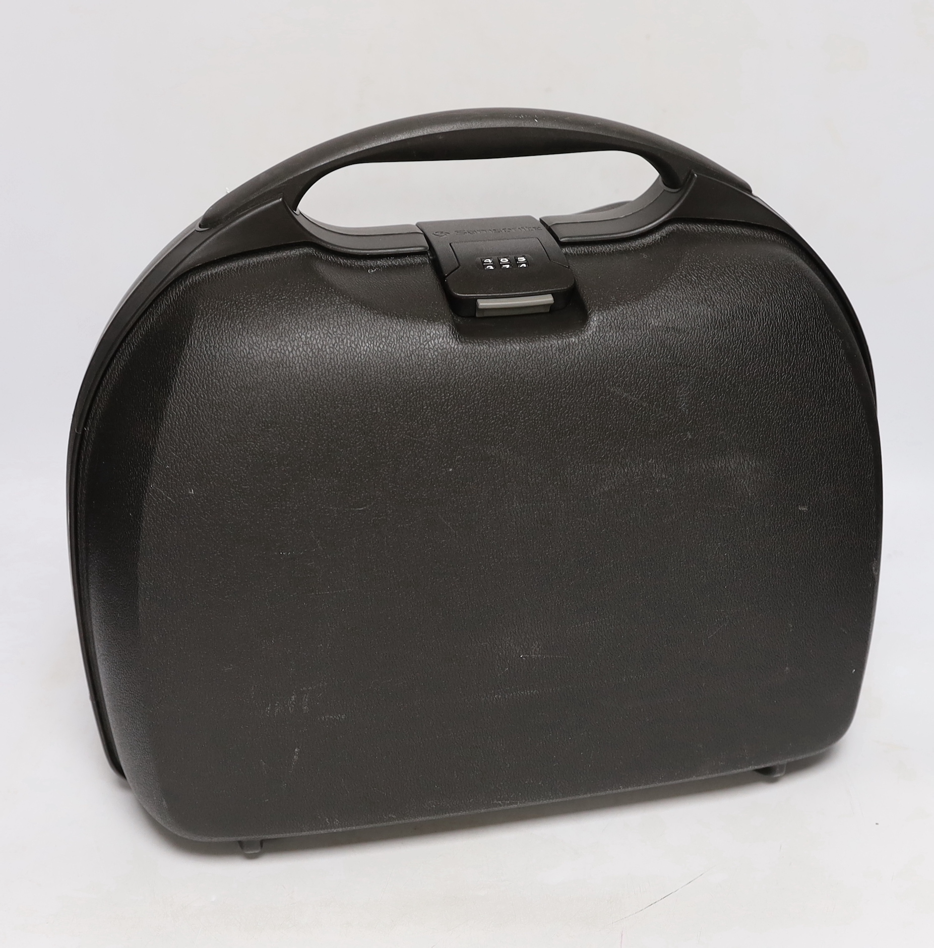 Hermes boxed red leather pen case, a Samsonite black hard plastic overnight case and a brown leather vanity/jewllery case, largest 34cm high